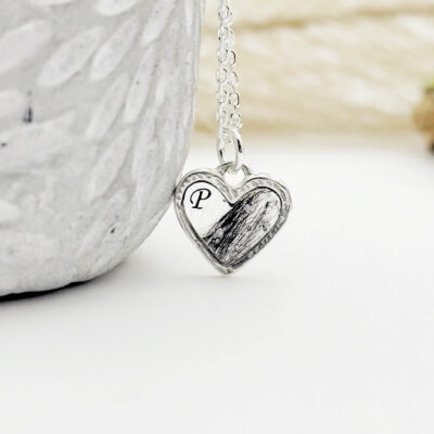 Srebrne serduszko z Twoimi kwiatami, włosami, prochami lub sierścią zwierząt  (srebro 925)